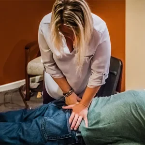 Chiropractor Chalfont PA Leah Garlan Adjusting Patient HP CIRCLE